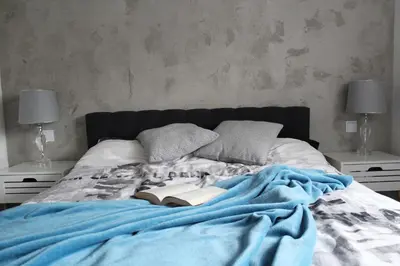 Łóżko lub łóżka w pokoju w obiekcie Apartament Wilanów Klimczaka