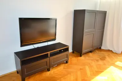 Telewizja i/lub zestaw kina domowego w obiekcie Słoneczny Apartament Grzybowska