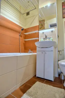 Łazienka w obiekcie Słoneczny Apartament Grzybowska