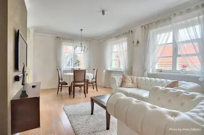 Telewizja i/lub zestaw kina domowego w obiekcie Royal Warsaw Apartment