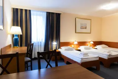 Łóżko lub łóżka w pokoju w obiekcie Noclegi Hit Rooms & Apartments