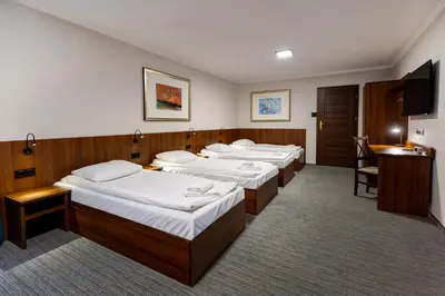 Łóżko lub łóżka w pokoju w obiekcie Noclegi Hit Rooms & Apartments