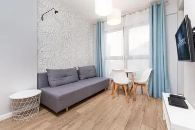 Telewizja i/lub zestaw kina domowego w obiekcie Chłodna Apartment by Your Freedom