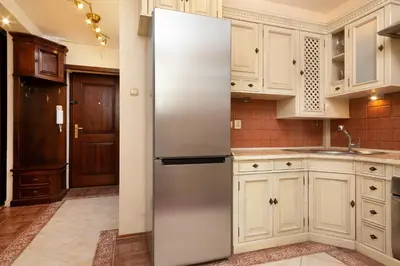 Kuchnia lub aneks kuchenny w obiekcie Apartments Warsaw Świętojańska by Noclegi Renters