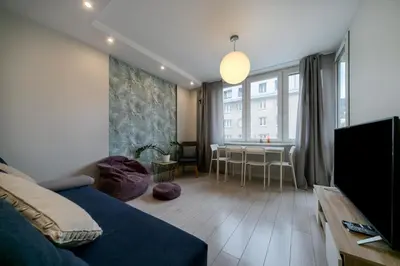 Telewizja i/lub zestaw kina domowego w obiekcie Warsaw Concierge Silver Apartment