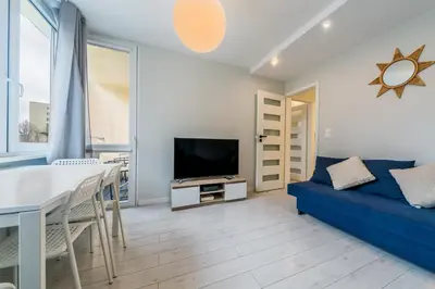 Telewizja i/lub zestaw kina domowego w obiekcie Warsaw Concierge Silver Apartment