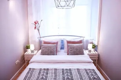 Łóżko lub łóżka w pokoju w obiekcie Chill & Explore by Cooee Apartments