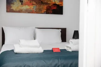 Łóżko lub łóżka w pokoju w obiekcie Varsovia Comfort by BookingHost