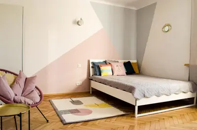 Łóżko lub łóżka w pokoju w obiekcie New Life Apartment next to Metro Station
