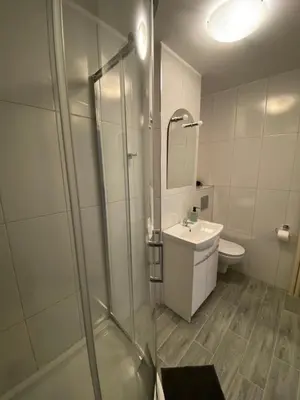 Łazienka w obiekcie Coser Apartamenty Metro ONZ