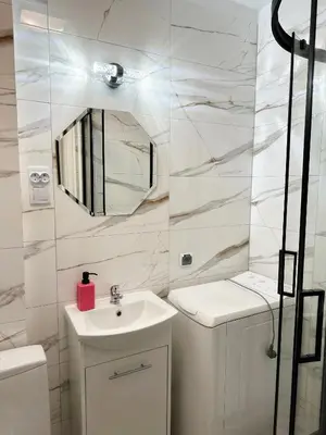 Łazienka w obiekcie Coser Apartamenty Metro ONZ