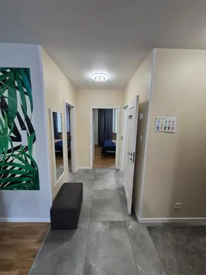 Łóżko lub łóżka w pokoju w obiekcie Modern Art Kredytowa-Dzieci do lat 7 nie płacą!