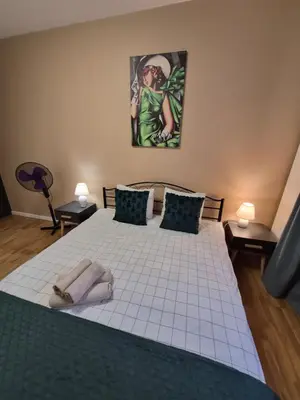 Łóżko lub łóżka w pokoju w obiekcie Modern Art Kredytowa-Dzieci do lat 7 nie płacą!