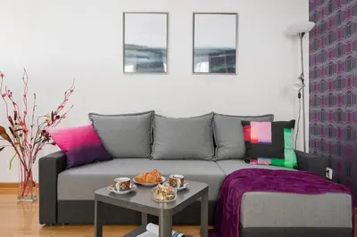 Część wypoczynkowa w obiekcie Elektoralna 12A - Colorful Apartment with Balcony by Noclegi Renters