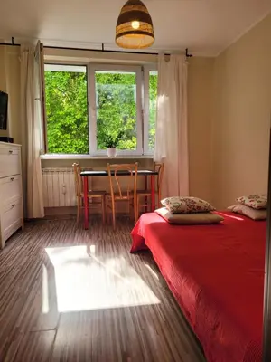 Łóżko lub łóżka w pokoju w obiekcie Sunny and lovely apartment. Near Chopin Airport!