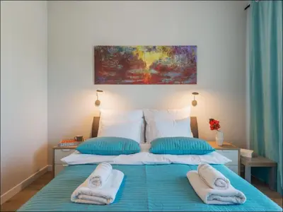 Łóżko lub łóżka w pokoju w obiekcie Okecie Airport Studio Bakalarska 2 P&O Serviced Apartments