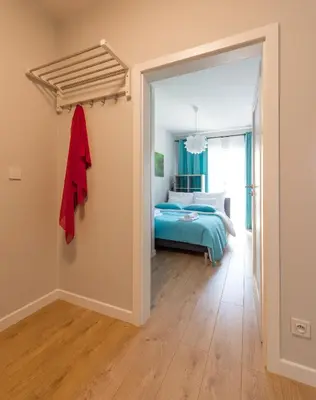 Łóżko lub łóżka w pokoju w obiekcie Okecie Airport Studio Bakalarska 2 P&O Serviced Apartments