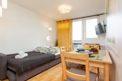Część wypoczynkowa w obiekcie Apartment Grzybowska by Noclegi Renters