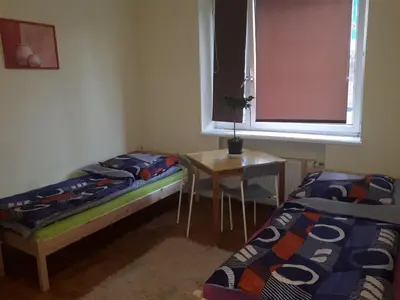 Łóżko lub łóżka w pokoju w obiekcie Macedonia Home