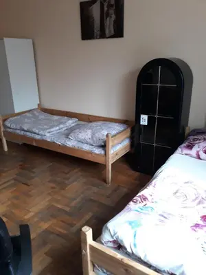 Łóżko lub łóżka w pokoju w obiekcie Macedonia Home