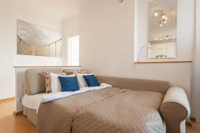 Łóżko lub łóżka w pokoju w obiekcie Szczesliwice Ochota P&O Serviced Apartments