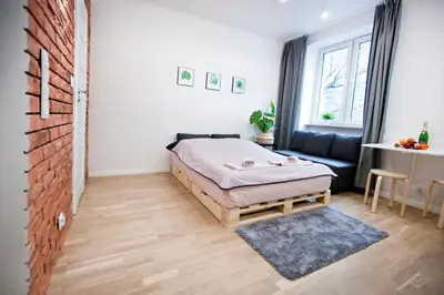 Łóżko lub łóżka w pokoju w obiekcie Studio Gaba 2 INTRACO Apartment