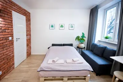 Łóżko lub łóżka w pokoju w obiekcie Studio Gaba 2 INTRACO Apartment
