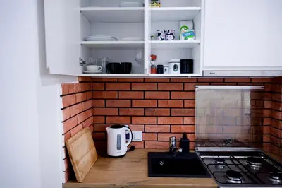 Kuchnia lub aneks kuchenny w obiekcie Studio Gaba 2 INTRACO Apartment