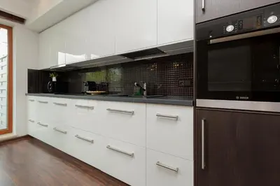 Kuchnia lub aneks kuchenny w obiekcie Apartment Warsaw Airport Kłobucka by Noclegi Renters