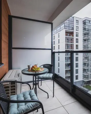 Balkon lub taras w obiekcie YourSecondFlat Grzybowska