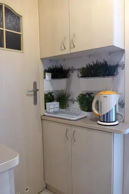 Kuchnia lub aneks kuchenny w obiekcie Przytulne mini studio na Saskiej Kępie