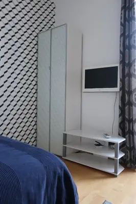 Telewizja i/lub zestaw kina domowego w obiekcie Przytulne mini studio na Saskiej Kępie