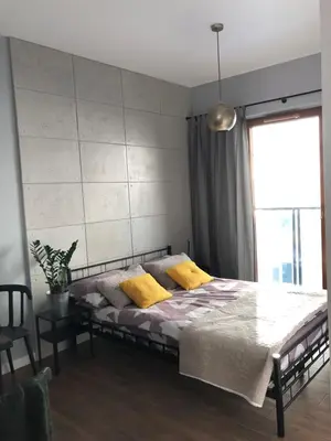 Łóżko lub łóżka w pokoju w obiekcie Pawia Studio