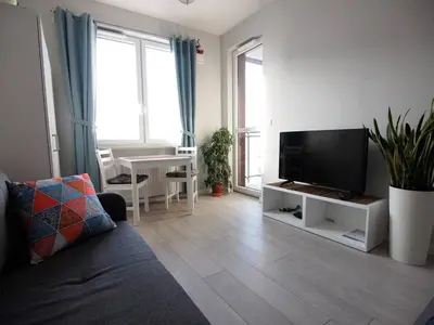 Telewizja i/lub zestaw kina domowego w obiekcie Airport Residence Blue