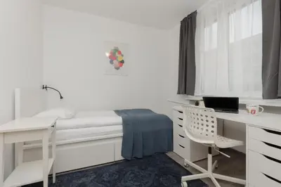 Łóżko lub łóżka w pokoju w obiekcie Apartments City Center by Noclegi Renters
