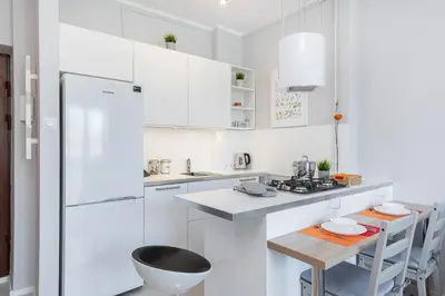 Kuchnia lub aneks kuchenny w obiekcie Apartments City Center by Noclegi Renters