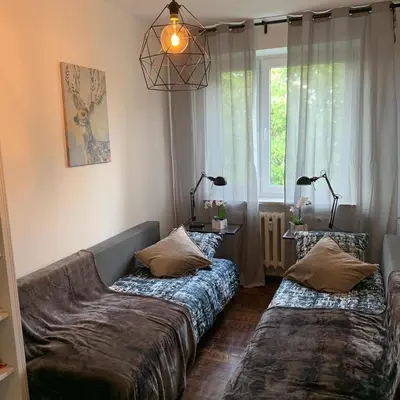 Łóżko lub łóżka w pokoju w obiekcie Your Home in Warsaw - Apartment Stegny- Mokotow