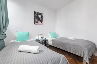 Łóżko lub łóżka w pokoju w obiekcie Apartaments Solec 79 by Noclegi Renters
