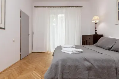 Łóżko lub łóżka w pokoju w obiekcie Powiśle Superior Apartment by BookingHost