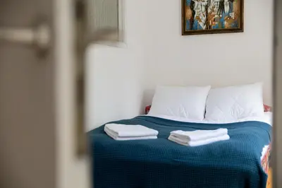 Łóżko lub łóżka w pokoju w obiekcie Powiśle Superior Apartment by BookingHost