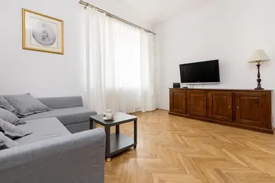 Telewizja i/lub zestaw kina domowego w obiekcie Powiśle Superior Apartment by BookingHost