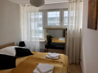Łóżko lub łóżka w pokoju w obiekcie EP Apartment