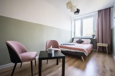 Łóżko lub łóżka w pokoju w obiekcie Słoneczny i cichy apartament przy Starym Mieście