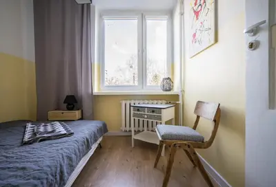 Łóżko lub łóżka w pokoju w obiekcie Słoneczny i cichy apartament przy Starym Mieście