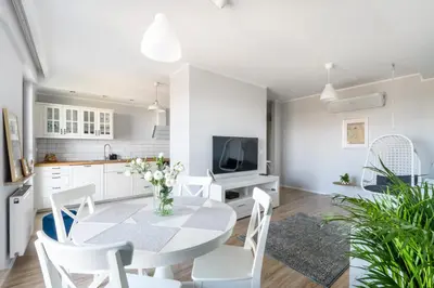 Telewizja i/lub zestaw kina domowego w obiekcie West Side Apartment