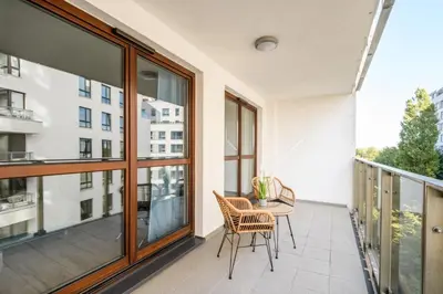 Balkon lub taras w obiekcie West Side Apartment