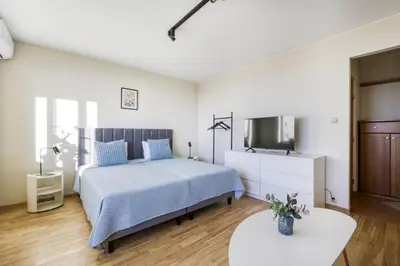 Łóżko lub łóżka w pokoju w obiekcie Gama Home Kondratowicza18