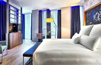 Łóżko lub łóżka w pokoju w obiekcie NYX Hotel Warsaw by Leonardo Hotels