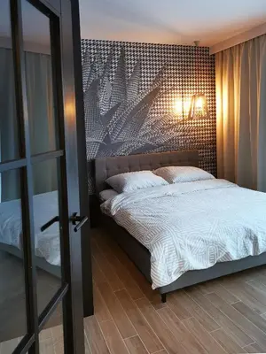 Łóżko lub łóżka w pokoju w obiekcie Come&Stay apartments Wola