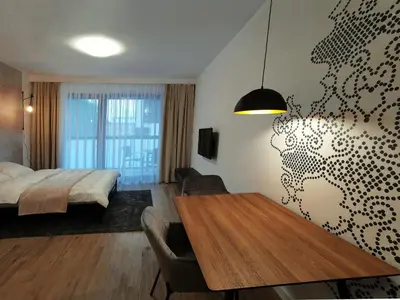 Łóżko lub łóżka w pokoju w obiekcie Come&Stay apartments Wola